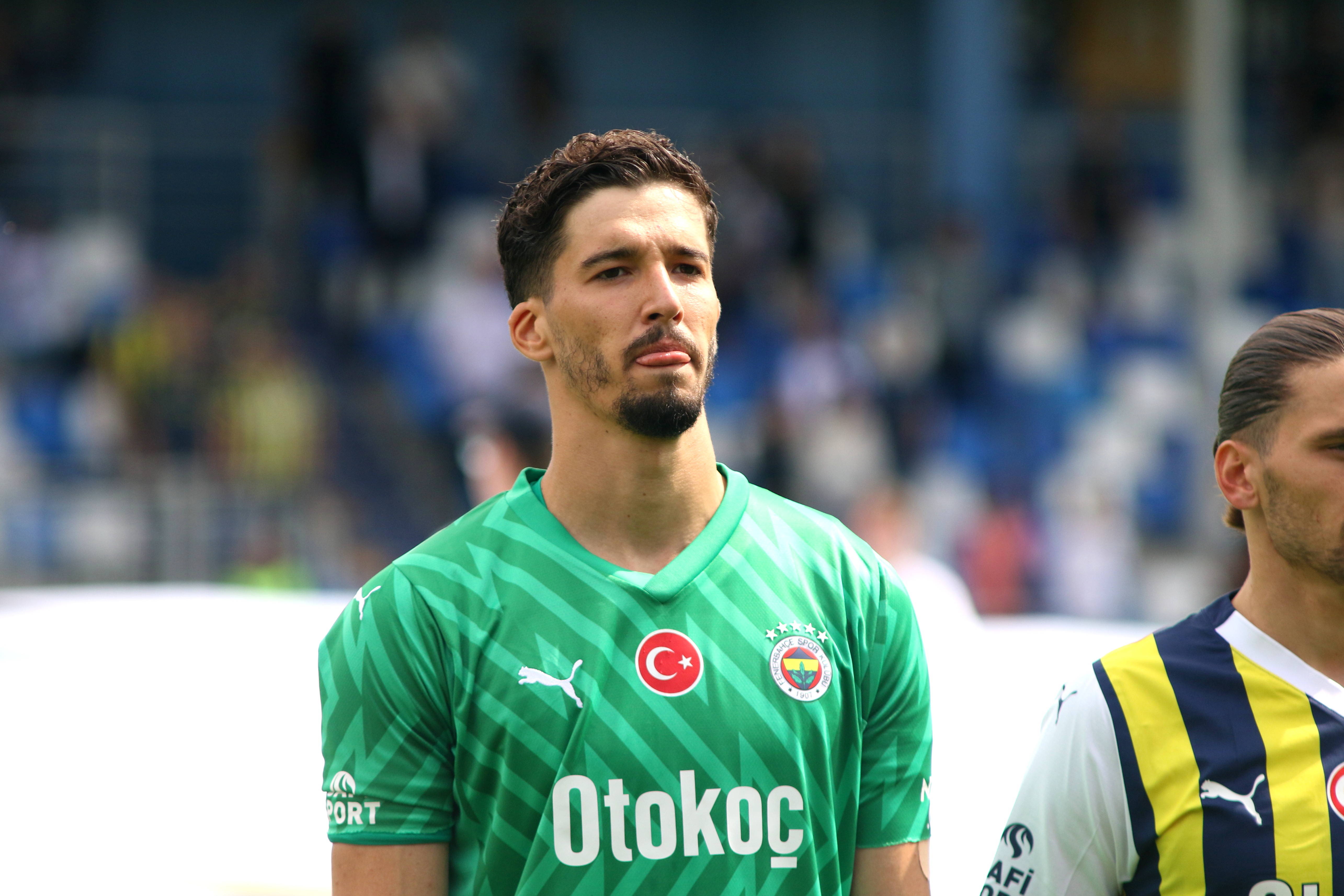 Goalkeeper Altay Bayindir pictured lining up before playing for Fenerbahce against Neftci Baku in July 2023